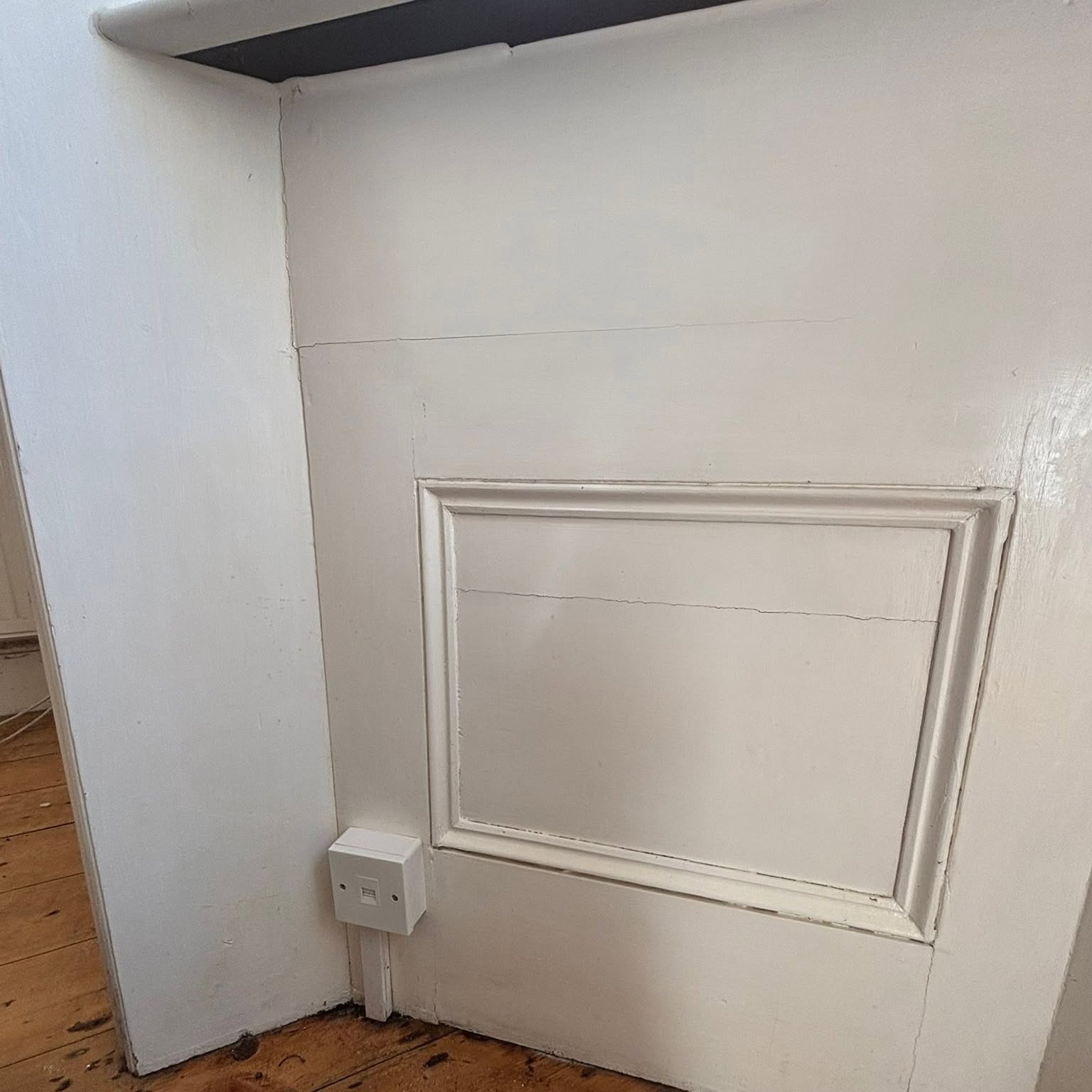 The same wall panel spotless after a Neat And Tidy deep clean